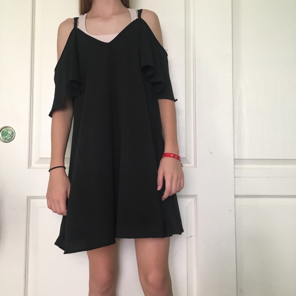 Black cold shoulder dress.
